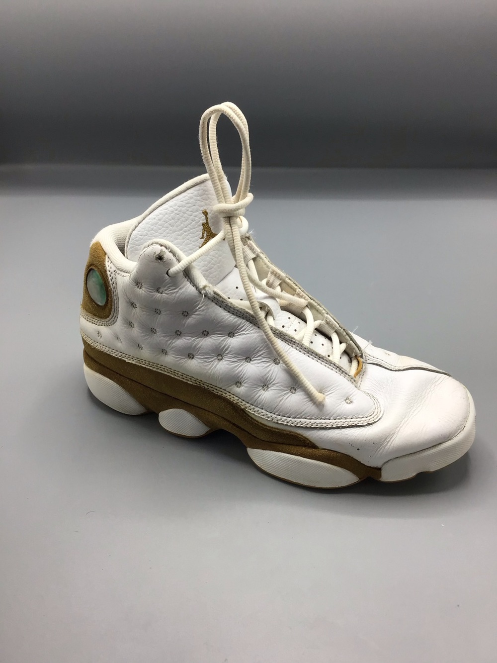 Jordan White and Tan Sneaker with Gold Accents